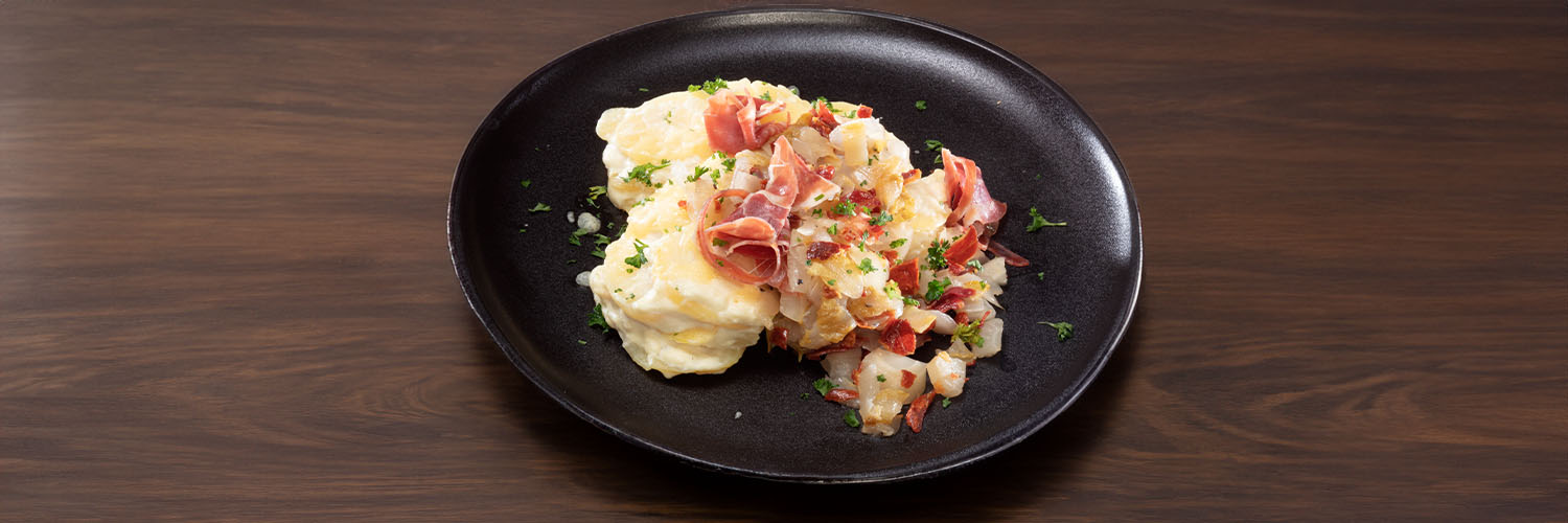 zomerse witlof gratin met gedroogde ham